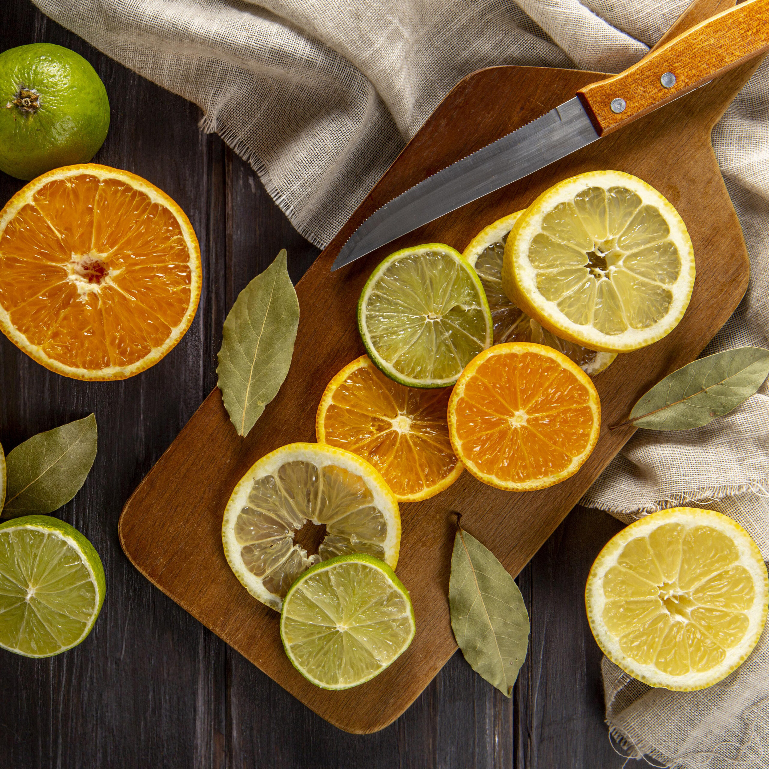 top-view-citrus-slices-with-knife